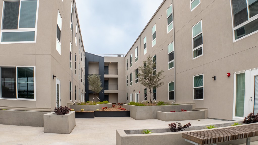Garden view of the West Carson Villas, a low-income supportive housing development. ECC and HERS verifications for LEED GOLD certification services performed. Energy Code Compliance. Home Energy Rating System. Torrance, CA, a city in Los Angeles County, Southern California.