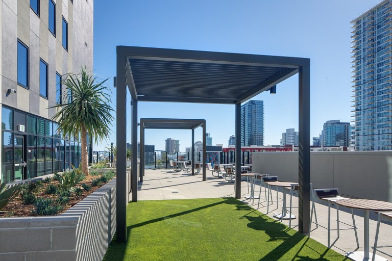 Exterior photo of the patio at the Harrington Heights apartments in San Diego, CA, a city in Southern California. Services provided here include ECC/HERS verifications for ENERGY STAR.