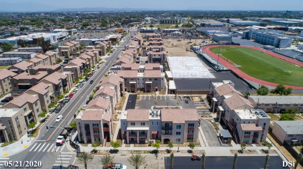 Aerial view of the Jordan Downs redevelopment in Watts, Los Angeles, CA. Services provided here include ECC (HERS) verifications and tests for LEED Gold certification, Air Balancing, and mechanical and lighting controls acceptance testing.